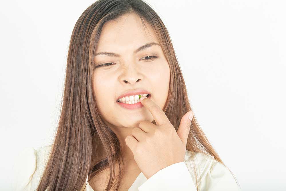 toothpaste-green-stains-teeth-dental-dost